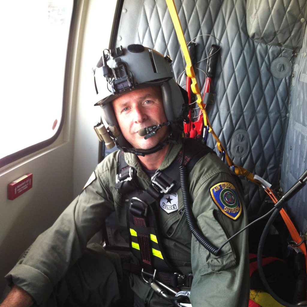 Pilot seated inside aircraft during aerial operations flight