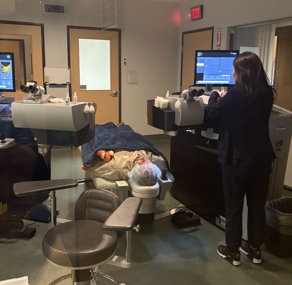 Man lying on a surgical table moments before undergoing LASIK eye surgery
