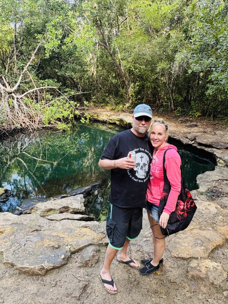 Couple standing in front of a cenote