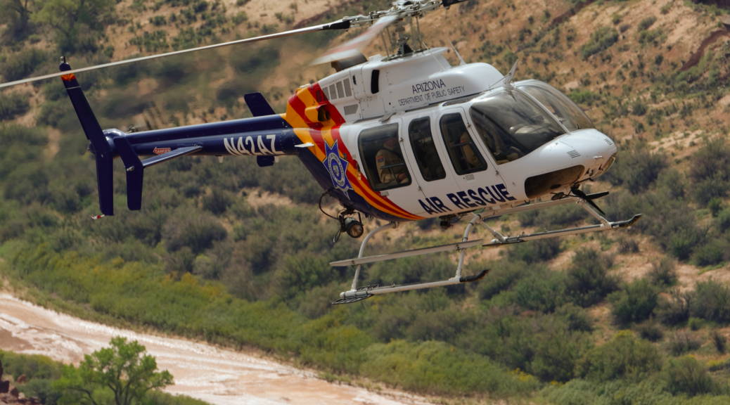 Arizona Department of Public Safety Bell 407 helicopter in flight, used for law enforcement and aerial support
