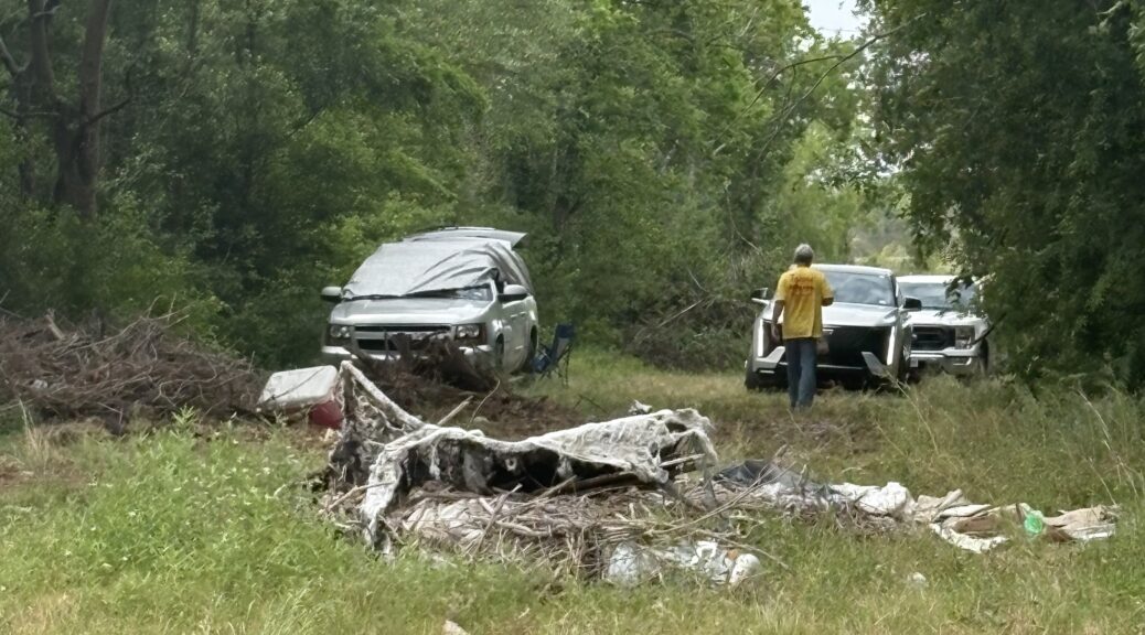 Texas EquuSearch Volunteers walking into dense wooded area during active human remains search in La Marque, Texas