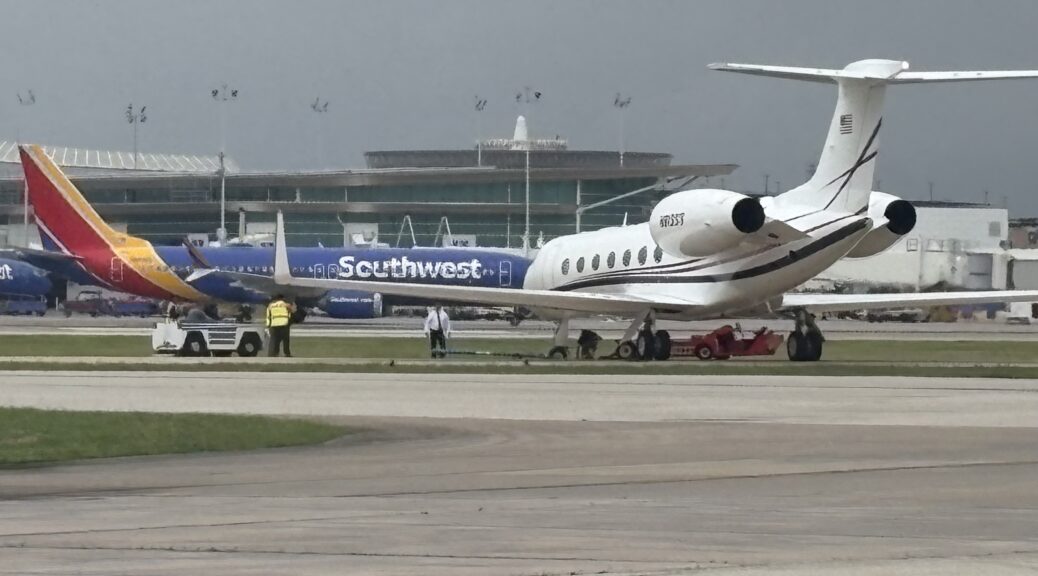 Private jet veers off taxiway at Houston Hobby Airport as emergency crews respond.