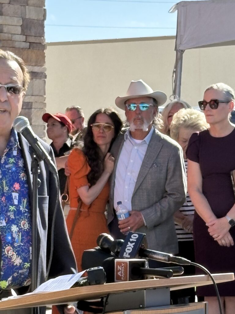 Arch Aplin stands with his daughter during the grand opening ceremony for Arizona’s first Buc-ee’s location in Goodyear, Arizona.