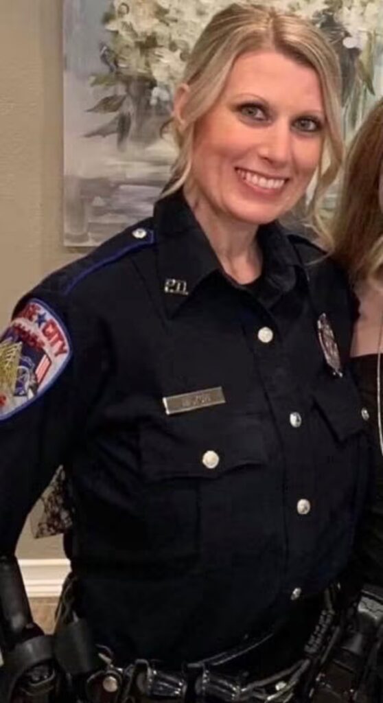 Brittany Pipkin poses in a police uniform during her law enforcement career. Pipkin, the daughter of Rebecca Beard, later used her investigative training to review records related to her mother’s unsolved murder case.
