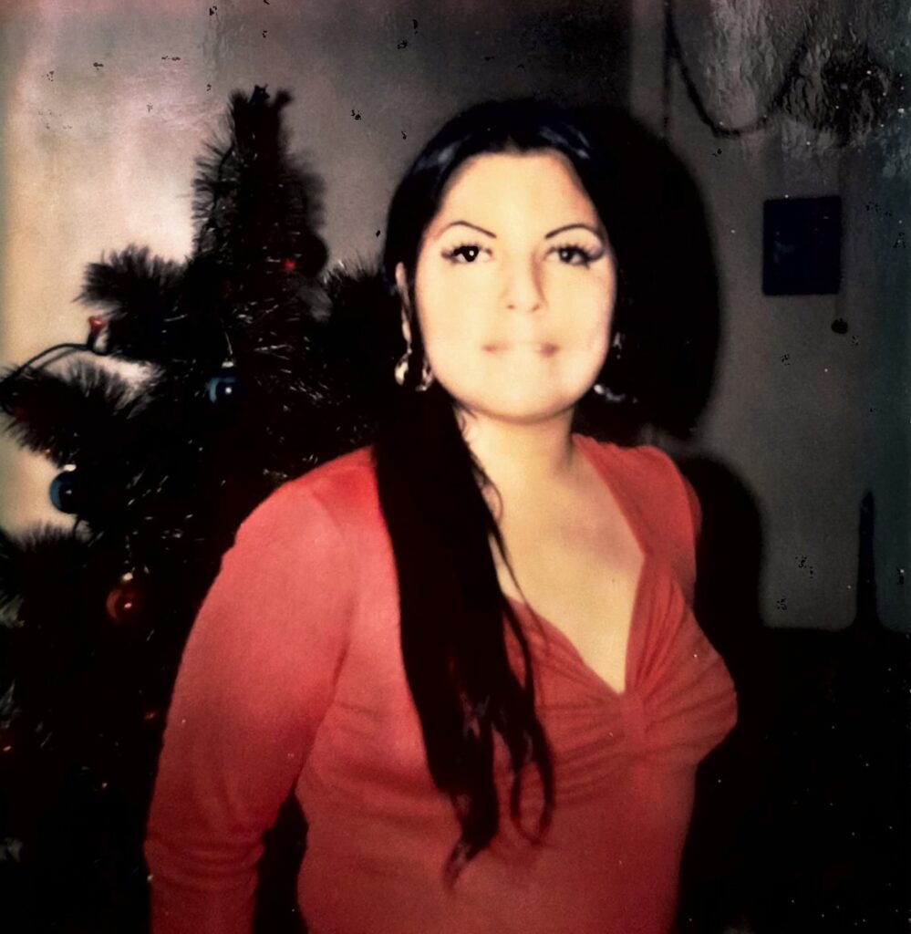 Carolyn Sosa in a red blouse in a family photograph taken before her disappearance in March 1987.