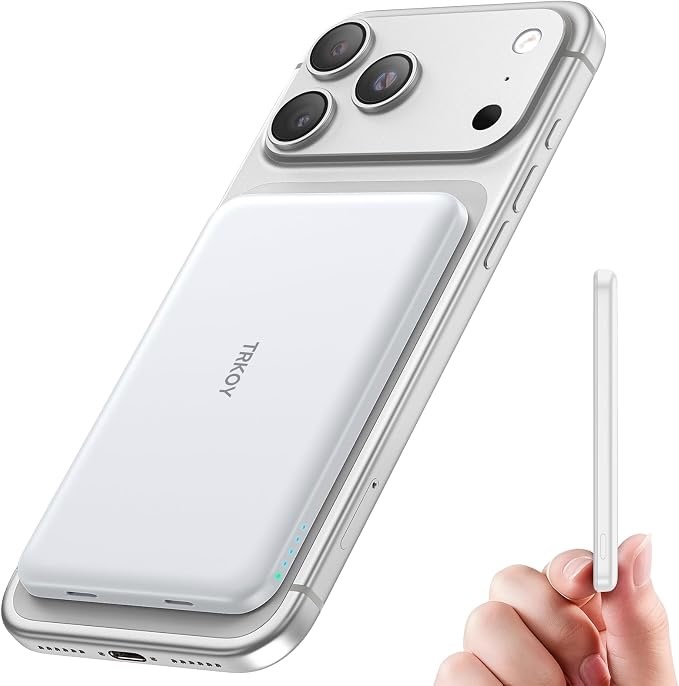 MagSafe portable charger attached to an iPhone, providing convenient wireless charging while traveling.