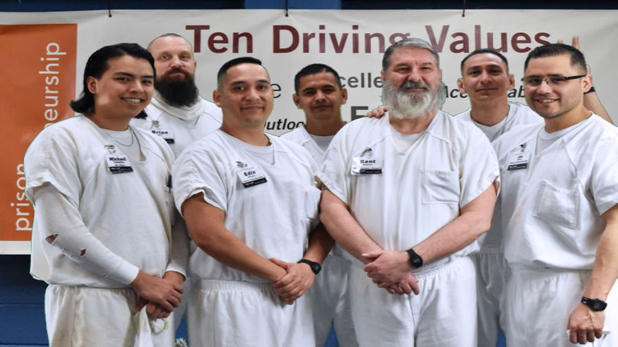 Former Harris County deputy Kent McGowen poses with fellow inmates during his incarceration in the Texas Department of Criminal Justice. McGowen says he met convicted serial killer Roy Alan Stuart while they were housed in the same prison unit.