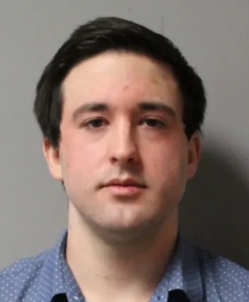 Mitchell Wasek booking photo in Travis County criminal case