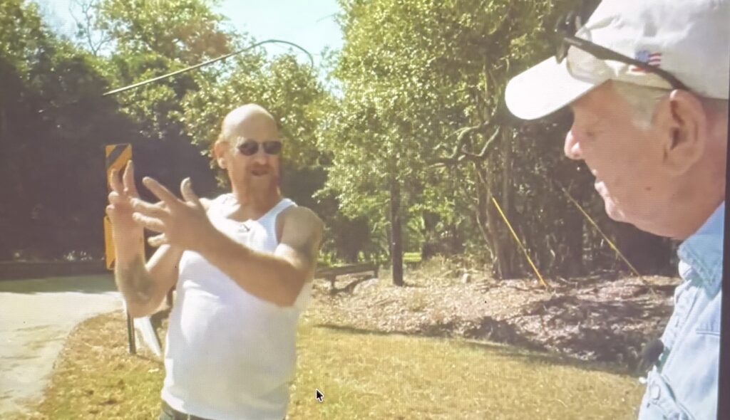 James Elmore Jr. points out a location near Calder Road during a 2022 recorded drive with Tim Miller.
