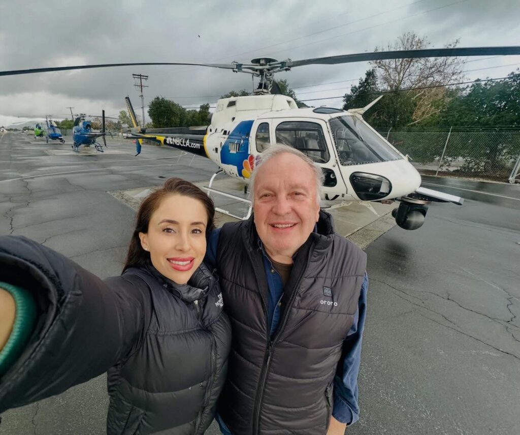 Eliana Moreno and George Marciniw pictured with an NBC Los Angeles news helicopter at Whiteman Airport.