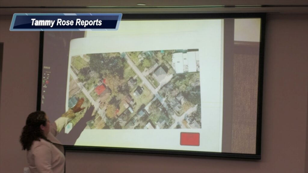 Prosecutor displays a map of Nevada Street showing Clyde Hedrick’s former Dickinson home during the James Elmore Jr. trial.