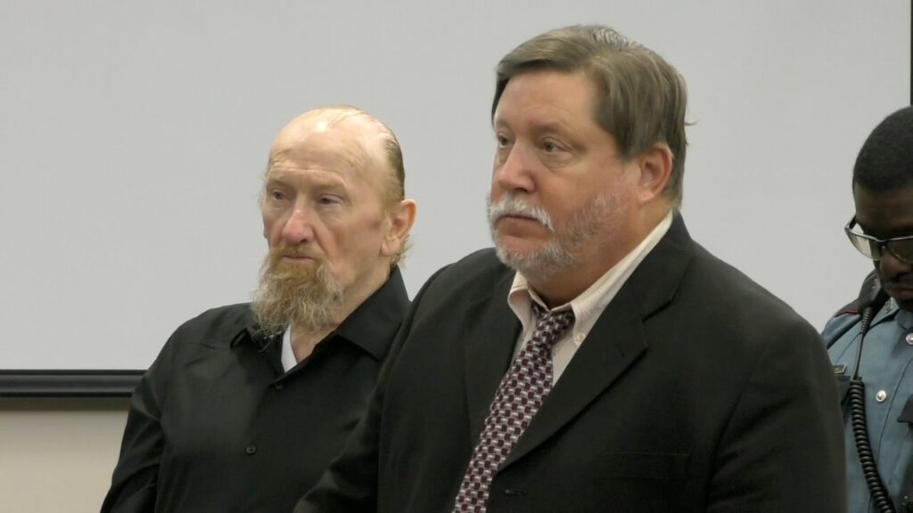 James Elmore Jr. sits beside his attorney during pretrial proceedings in Galveston County.
