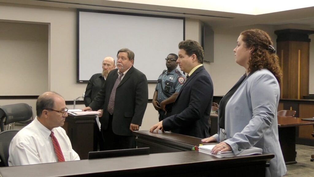 Prosecutors and court staff during a pretrial hearing in the James Elmore Jr. case in Galveston County.
