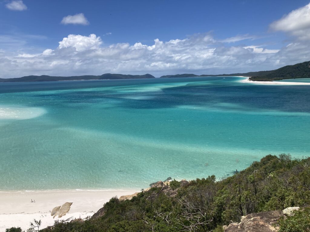 Turquoise waters, white sand beaches and tropical islands in the Whitsundays, Australia, during Tammy Rose's travels.