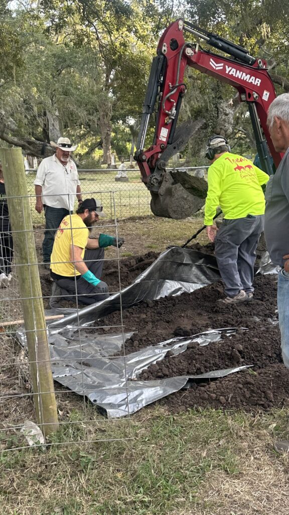 Excavation crew using heavy equipment to search for possible evidence near a Brazoria County cemetery in the 1986 Rebecca Beard cold case.